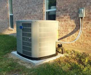 American Standard AC unit installed outside a customer's home in Benton AR